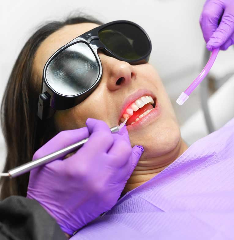 Dentist using a modern diode dental laser in Stafford, VA