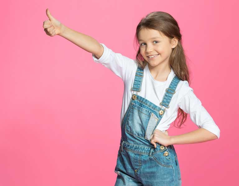 Girl showing a thumbs up in Stafford, VA