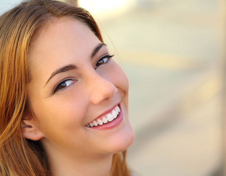 Smiling woman with healthy white teeth in Stafford, VA