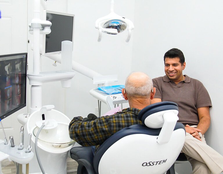 Dr. Sachin Karande discussing with a patient