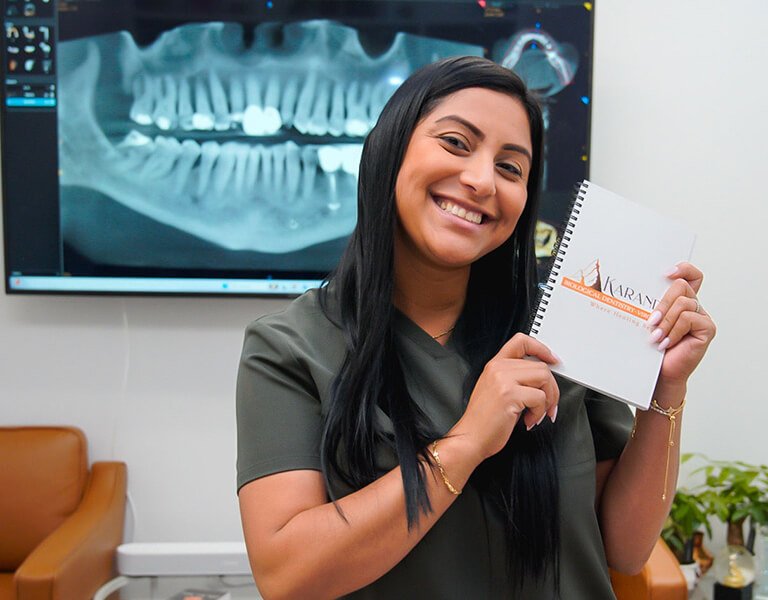 A Smiling Dental Staff Member at Karande Biological Dentistry